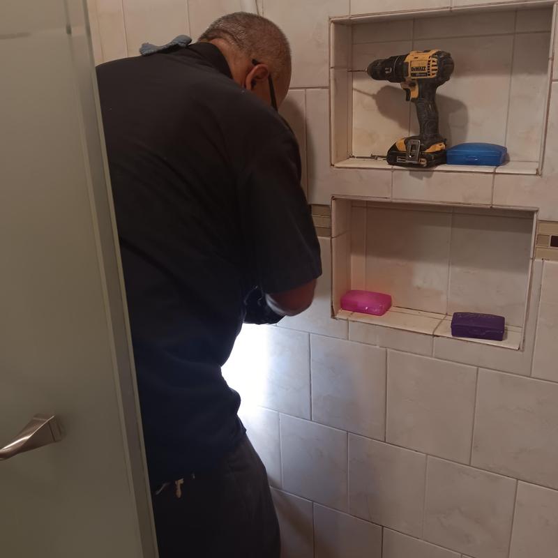 Single handle Moen shower valve installation in tiled shower