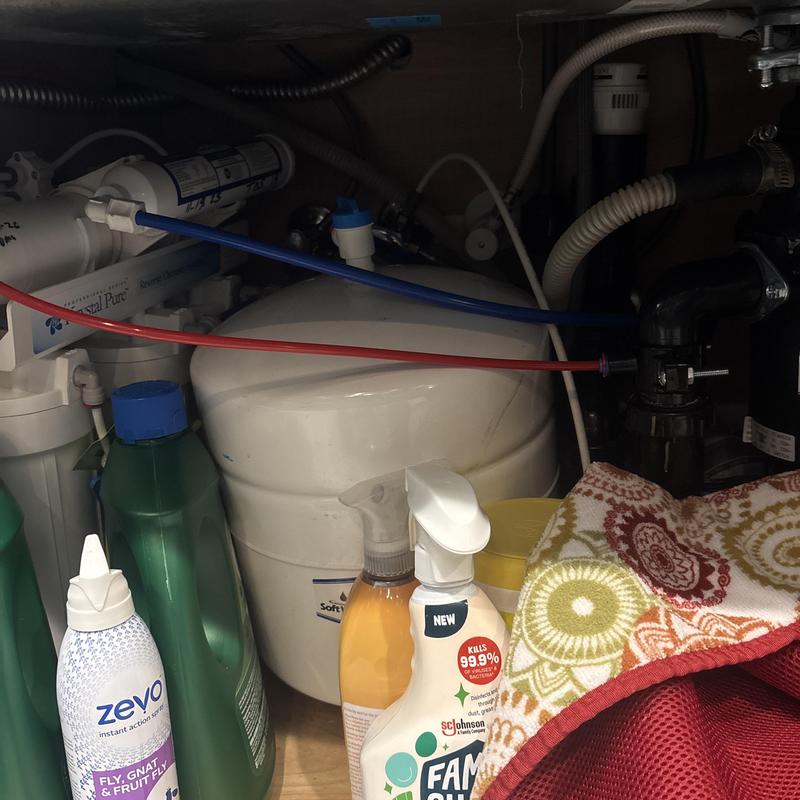 5 Stage Reverse Osmosis System under sink with cleaning supplies
