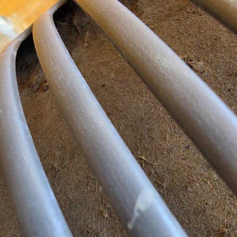 Lennox AC condenser coils with dust buildup close-up