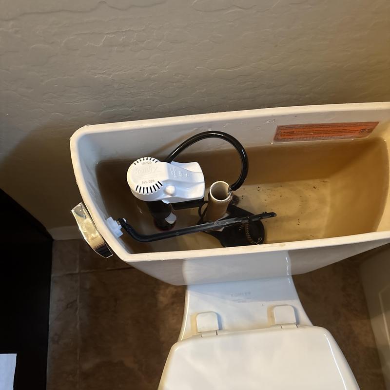 Toilet fill valve and flush valve inside tank