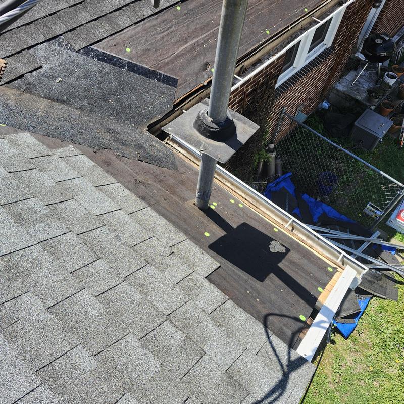 Roof flashing and shingle wear near vent pipe