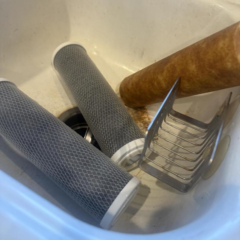 RO water filter cartridges removed for service