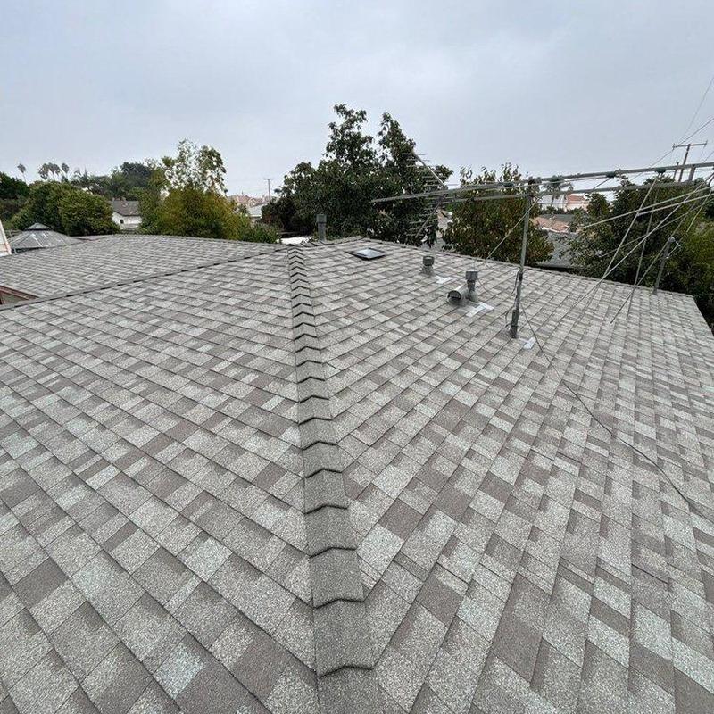 Shingle roof installation on residential home Shingle roof installation on residential home