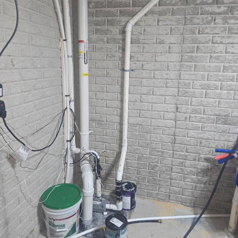 Liberty WaterJet backup sump pump installation and piping