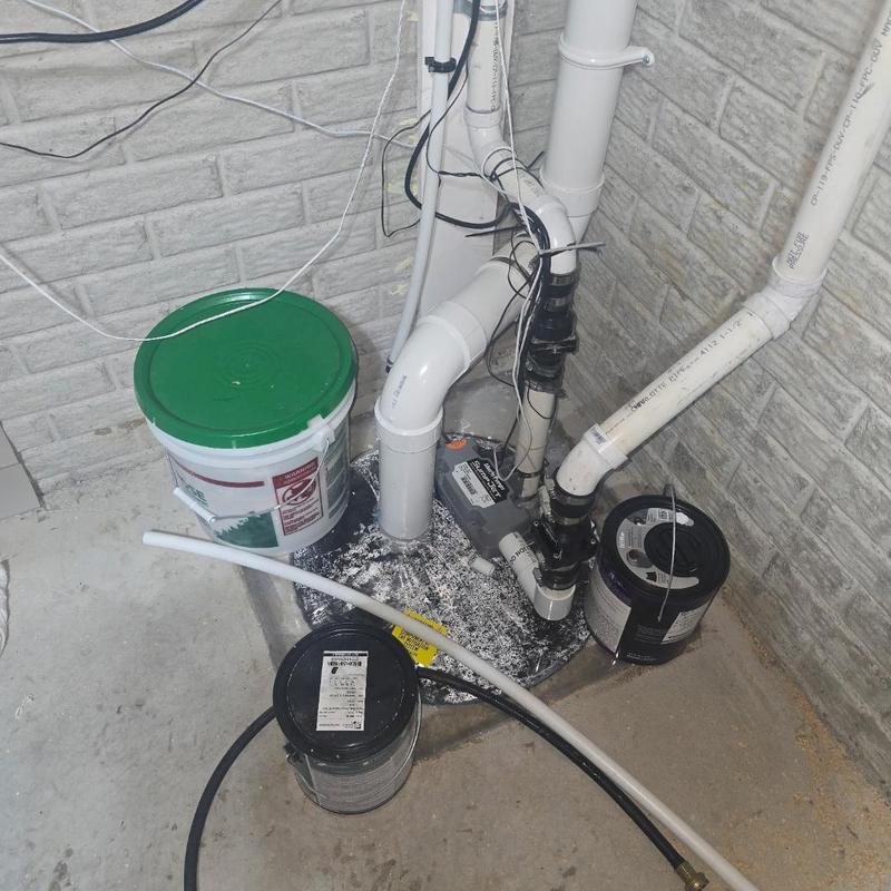 Liberty WaterJet backup sump pump with discharge line