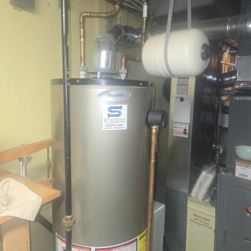 Thermal expansion tank and water heater setup