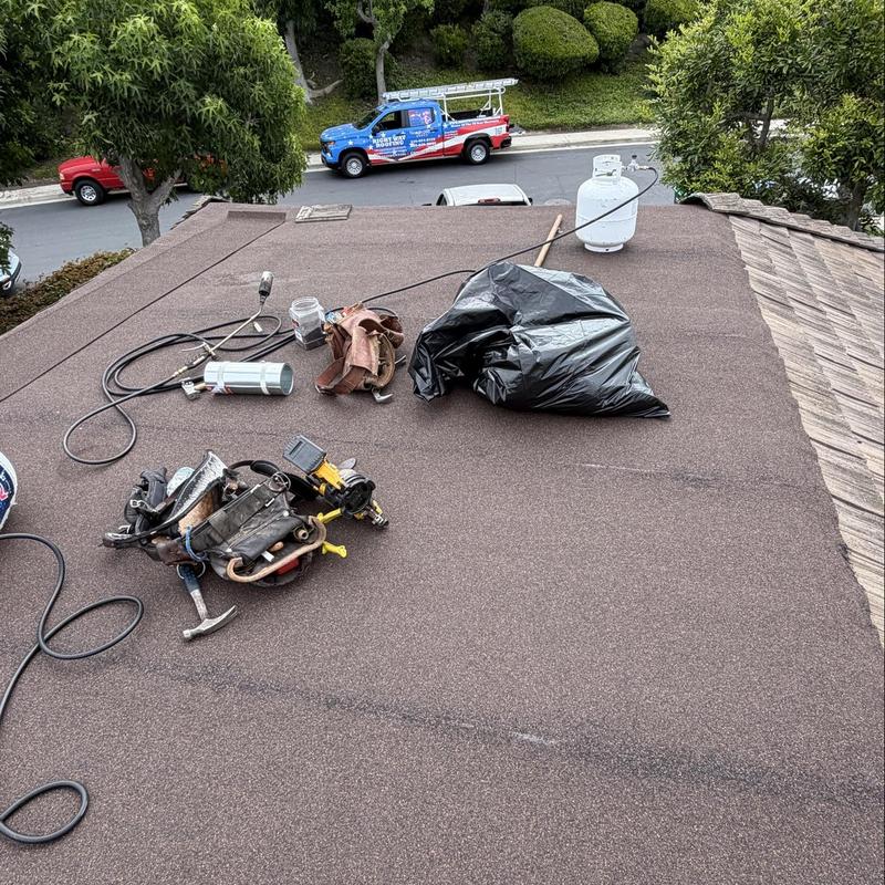Torch down flat roof with tools and propane tank Torch down flat roof with tools and propane tank