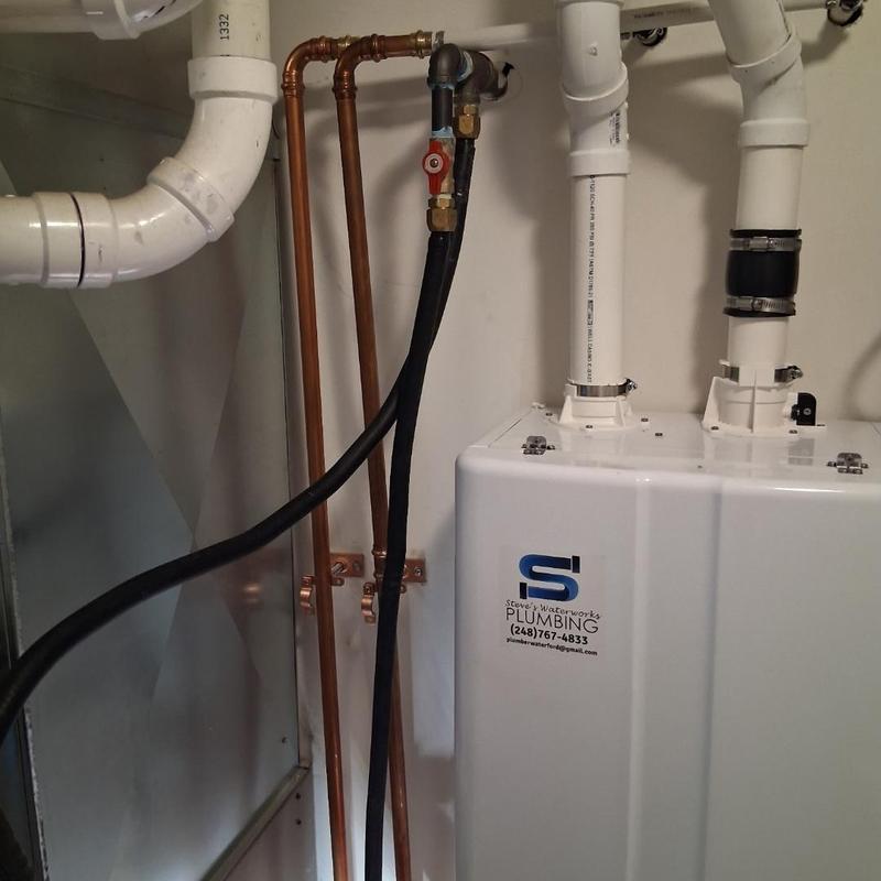 Tankless water heater with copper repipe and valves
