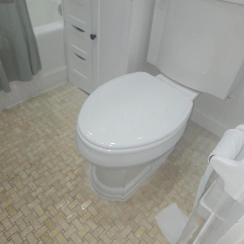 Toilet installation and bathroom floor tile work Toilet installation and bathroom floor tile work