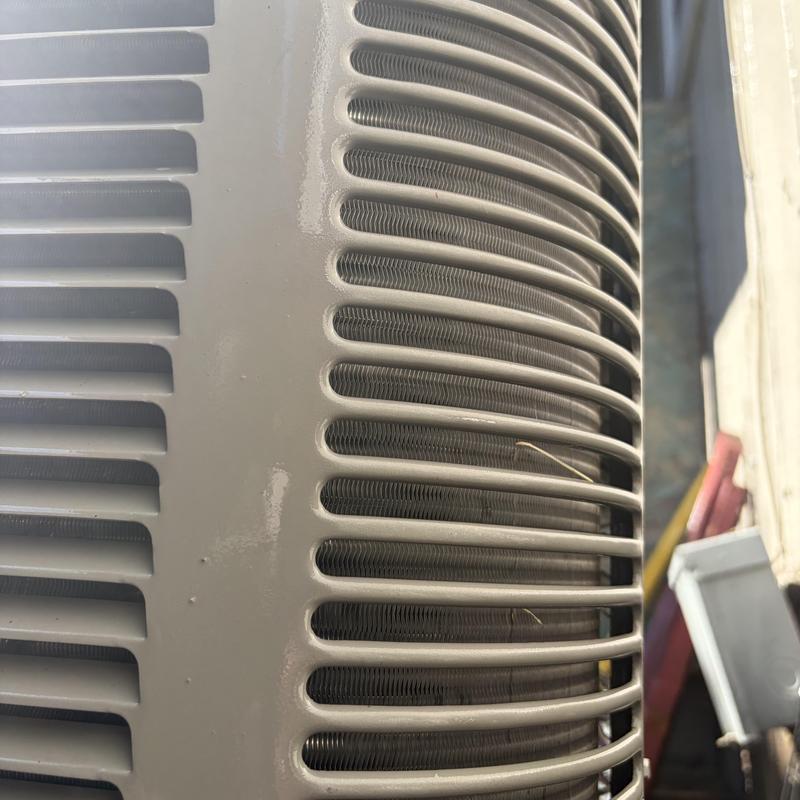 Outdoor air conditioner condenser coils close-up view Outdoor air conditioner condenser coils close-up view