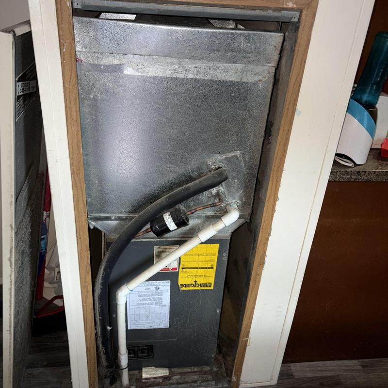Indoor air handler with refrigerant lines and wiring Indoor air handler with refrigerant lines and wiring