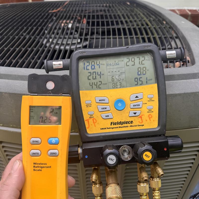 Refrigerant manifold and wireless refrigerant scale on AC unit