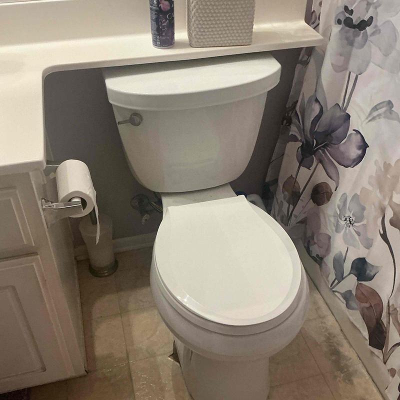 Toilet with new wax ring and water line installed
