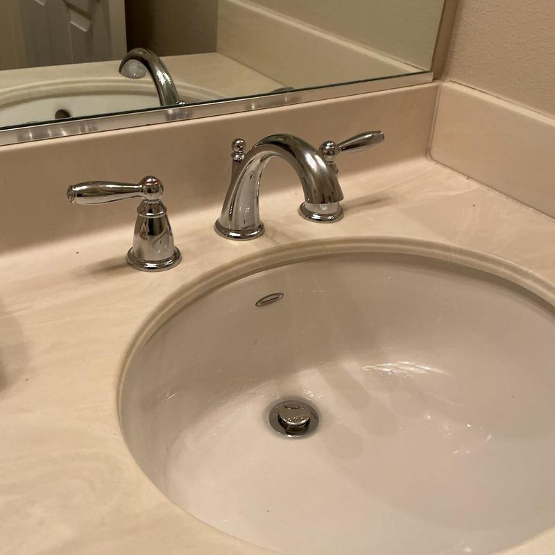 Widespread lavatory faucet installation on bathroom sink