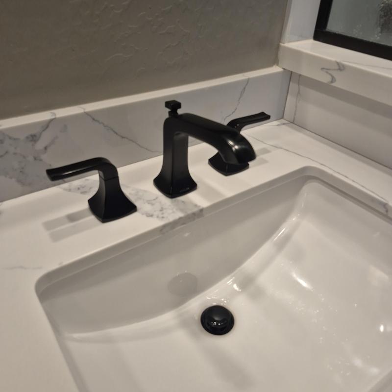 Bathroom sink faucet with matte black finish installed
