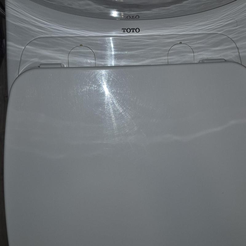 Toto soft close toilet seat installed in bathroom