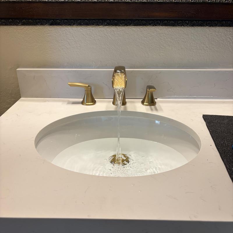 Widespread lavatory faucet and sink running water