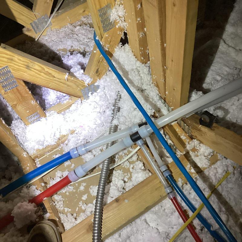 Hot and cold water PEX lines with tee connections