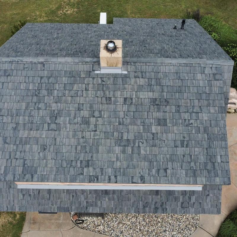 Brava Composite Cedar Shake roof with chimney detail Brava Composite Cedar Shake roof with chimney detail