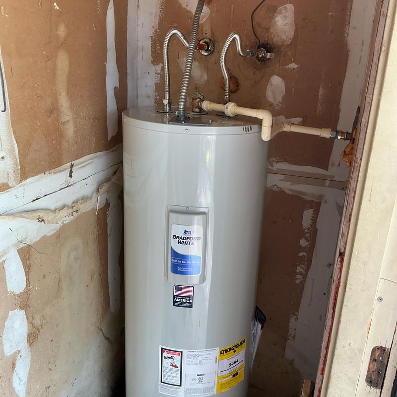 50-gallon electric water heater with new drain pan 50-gallon electric water heater with new drain pan