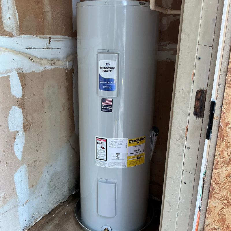 50-gallon electric water heater with drain pan installed 50-gallon electric water heater with drain pan installed