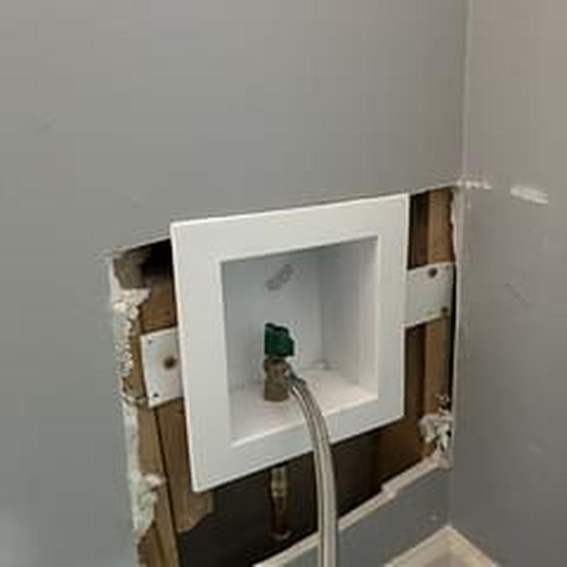Ice maker box with water line installation in wall