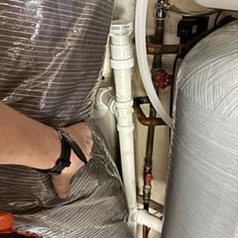 Water softener drain with stand pipe and air admittance valve