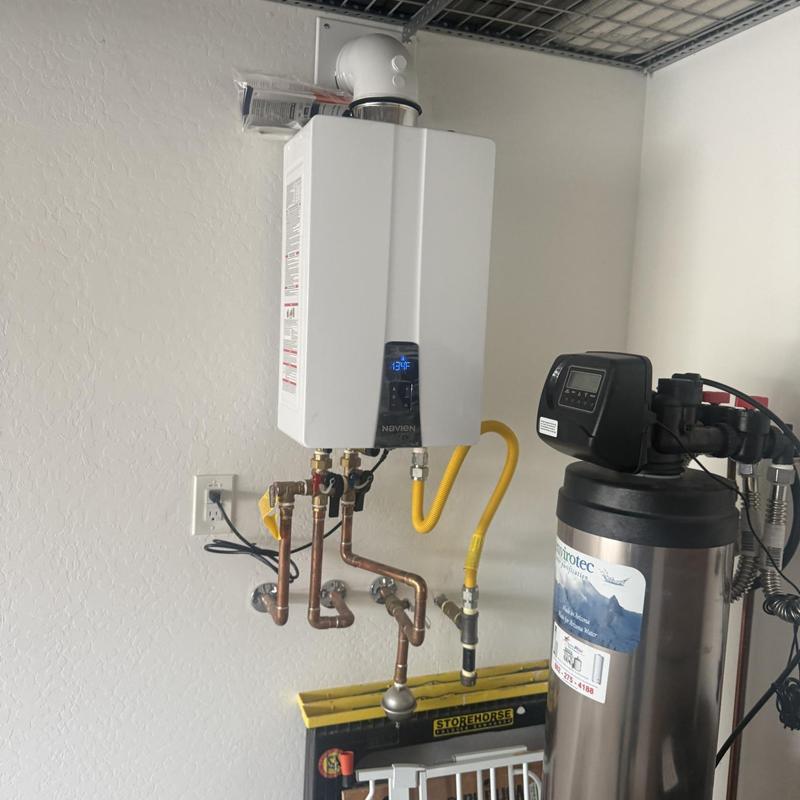 Tankless water heater with copper and gas piping