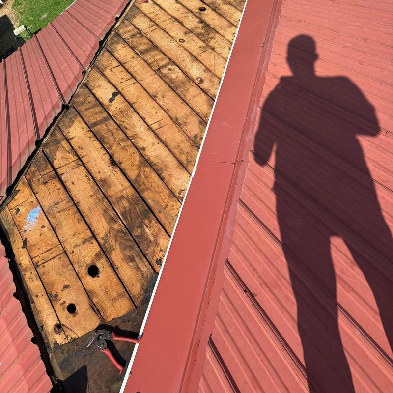Roof valley wood decking deterioration and metal panels Roof valley wood decking deterioration and metal panels