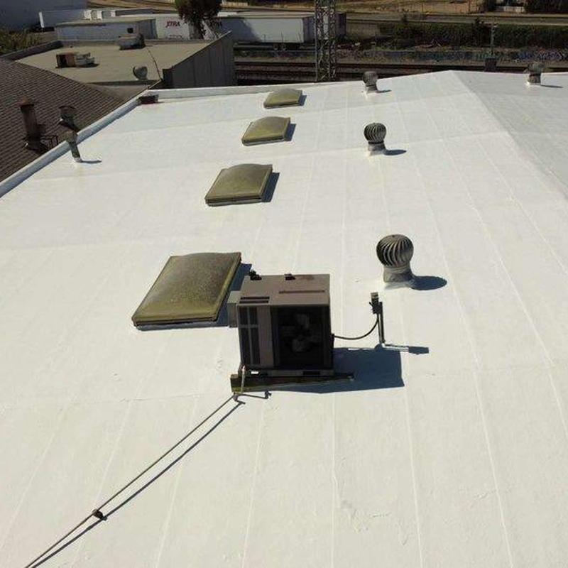 Commercial flat roof with HVAC and vents Commercial flat roof with HVAC and vents