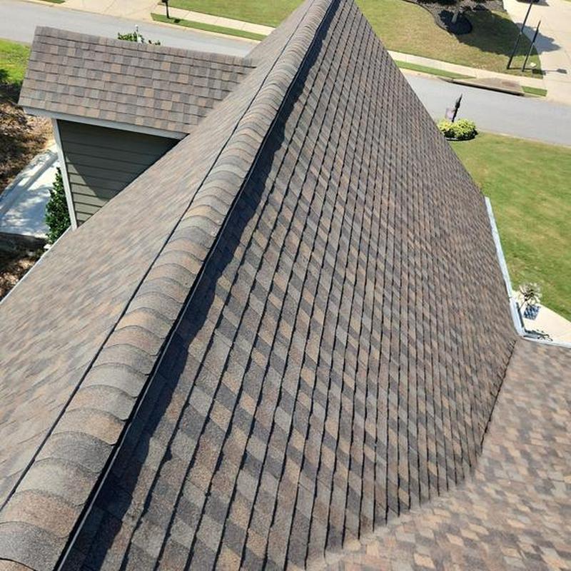 Asphalt shingle roof with ridge cap installation