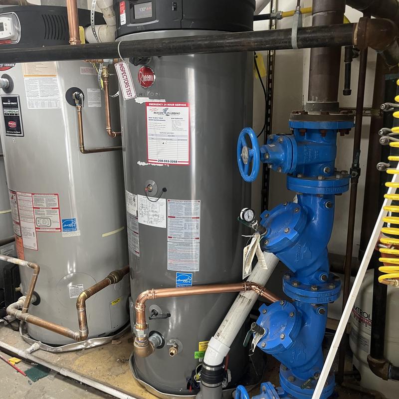 Commercial water heater with valve and copper piping Commercial water heater with valve and copper piping