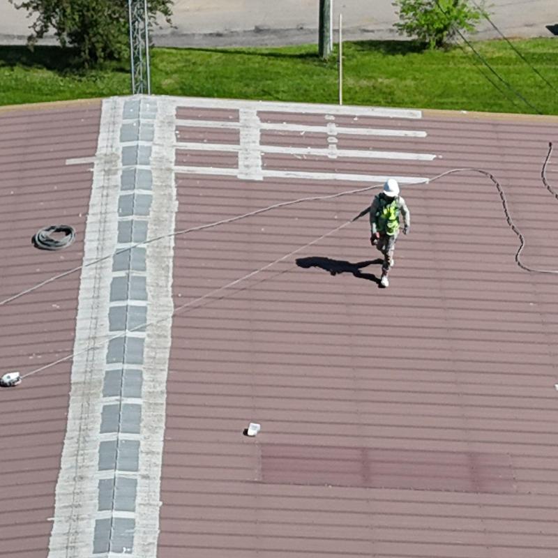 Metal roof inspection with hail damage assessment