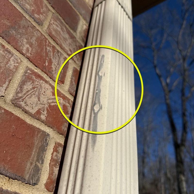 Vinyl column with surface damage highlighted in yellow
