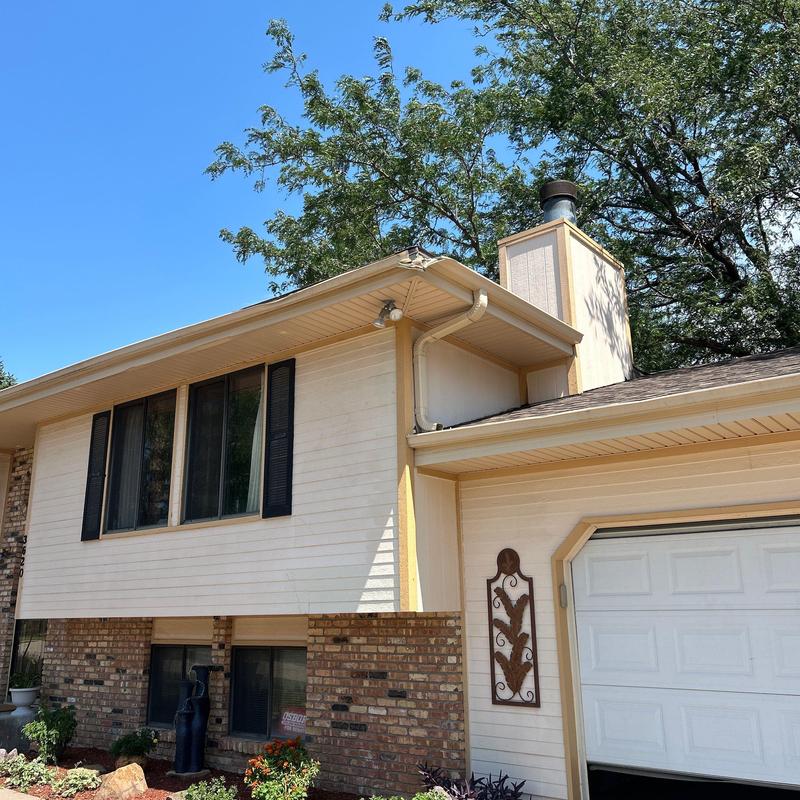 Mastic aluminum gutters on residential home exterior Mastic aluminum gutters on residential home exterior