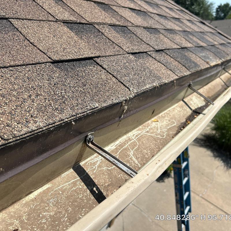 Aluminum gutter coil installation with shingle roof Aluminum gutter coil installation with shingle roof