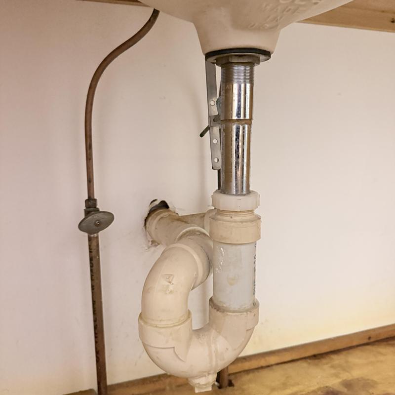 Bathroom sink drain and emergency stop valve installation