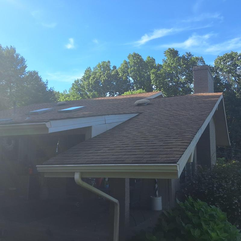 Skylight leak points on aged roof shingles
