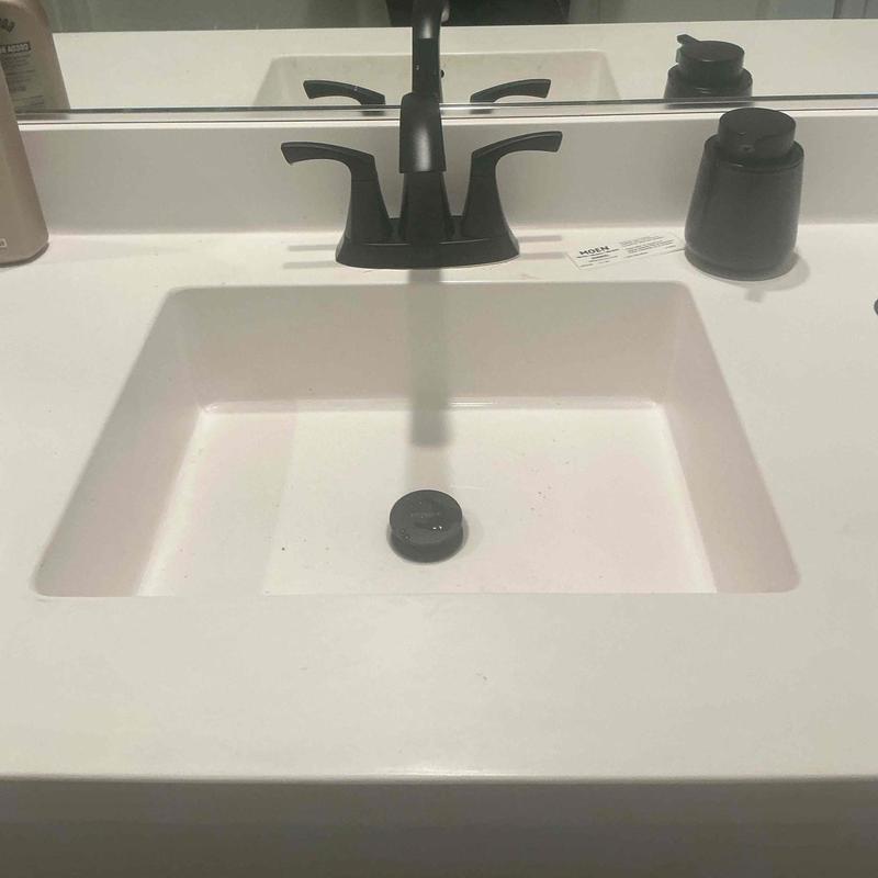 Matte black bathroom faucet and pop-up drain assembly