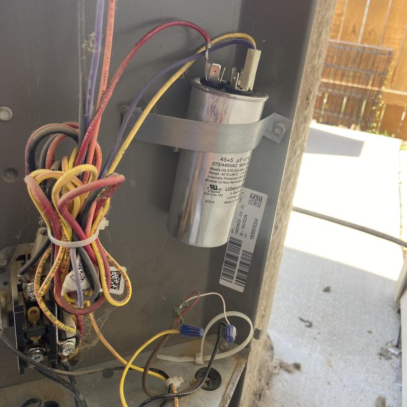 AC outdoor condenser capacitor with wiring connections AC outdoor condenser capacitor with wiring connections