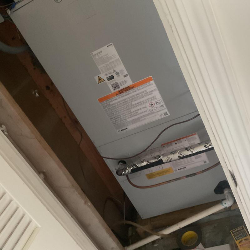 HVAC air handler unit installed in closet space