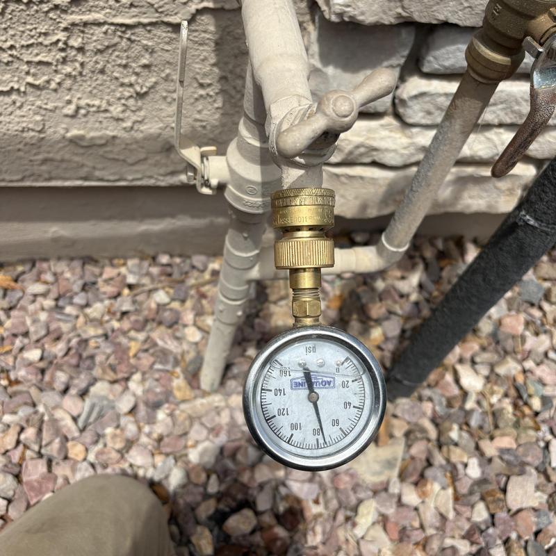 Pressure gauge on outdoor water spigot in Glendale, AZ