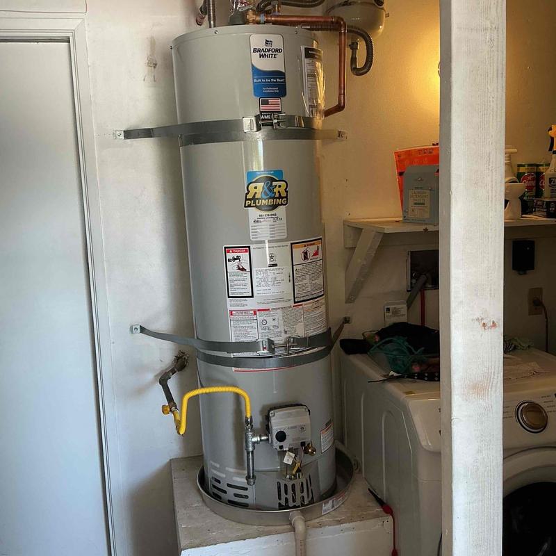 40-gallon water heater with new plumbing installation