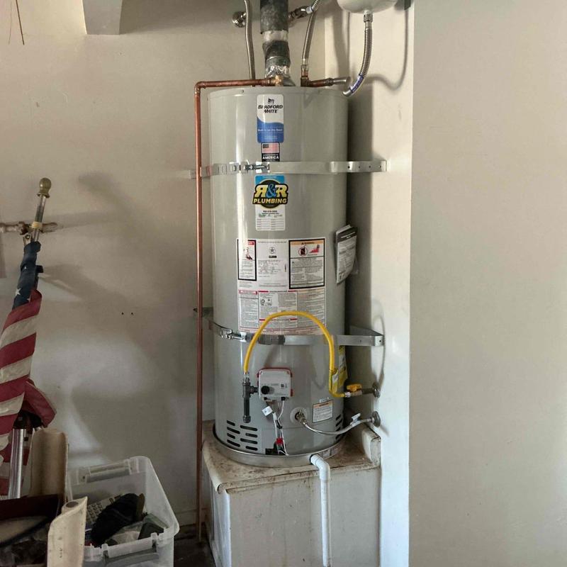 50-gallon water heater with new plumbing installation