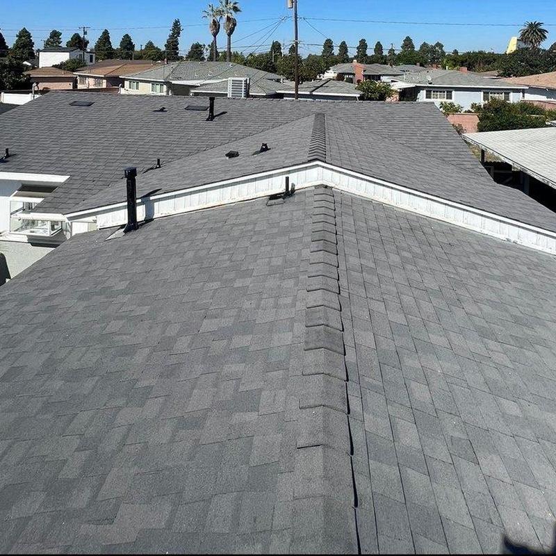 Asphalt shingle roof with ridge vent installation Asphalt shingle roof with ridge vent installation