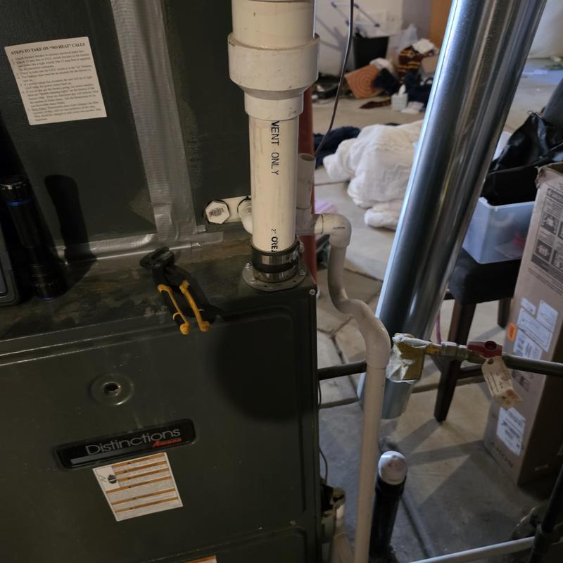 Condensate drain line with new piping and cleanout access