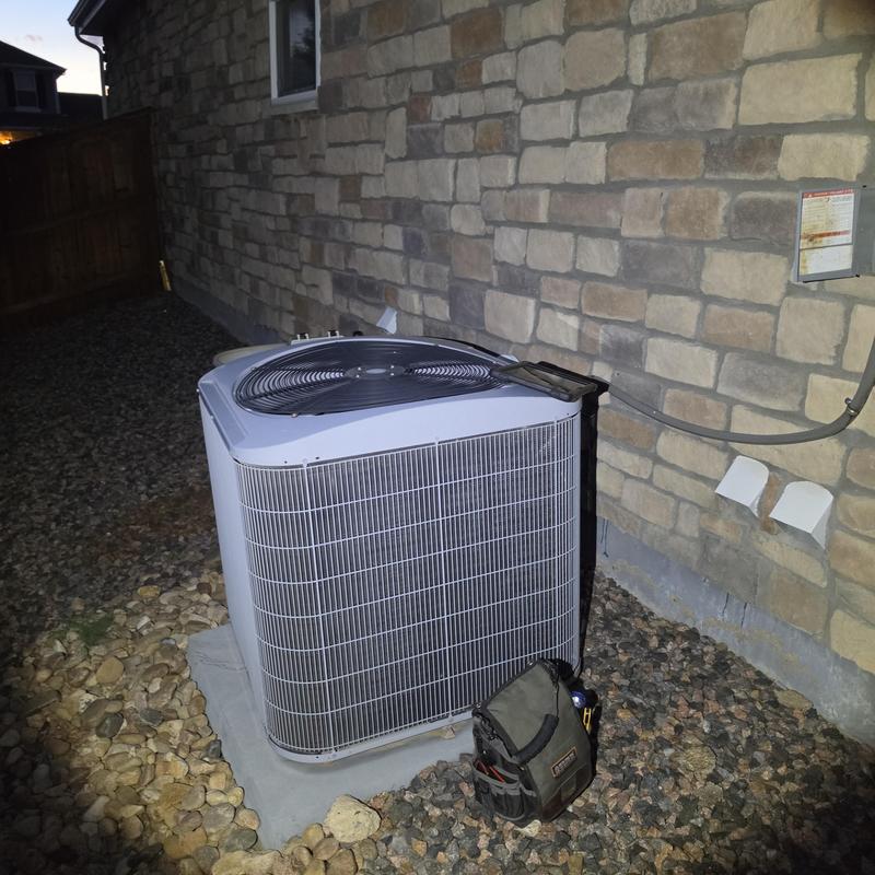 Carrier air conditioner unit with added refrigerant in Aurora