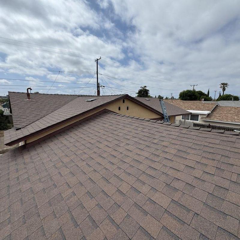 Shingle roof installation on residential home Shingle roof installation on residential home