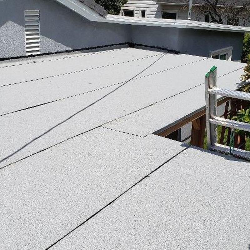 Flat roof with new weather-resistant membrane installed Flat roof with new weather-resistant membrane installed