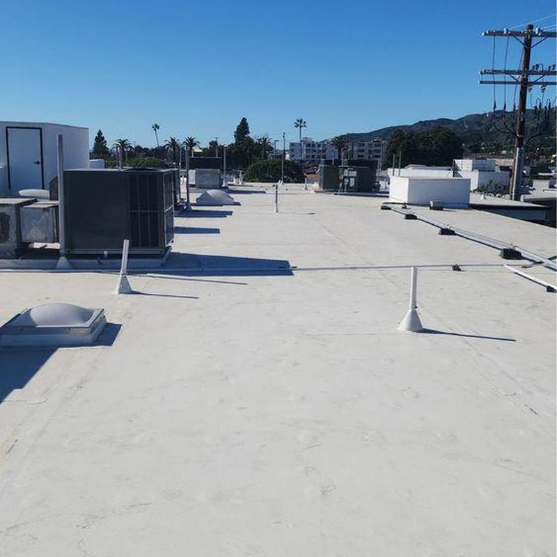 Commercial flat roof with HVAC units and vents Commercial flat roof with HVAC units and vents